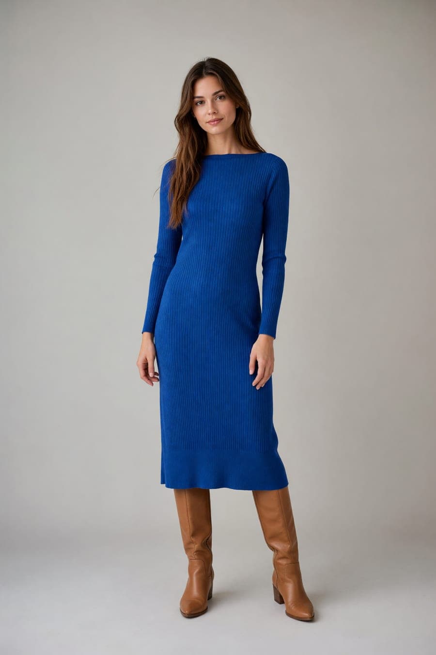 The same person wearing cobalt knit midi dress, generated by AI