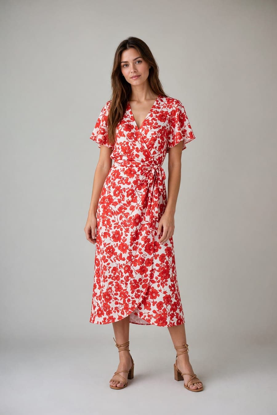 The same person wearing floral wrap midi dress, generated by AI